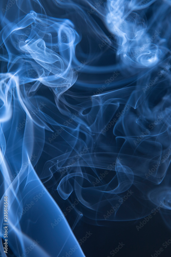 Fototapeta premium Abstract blue smoke swirls
