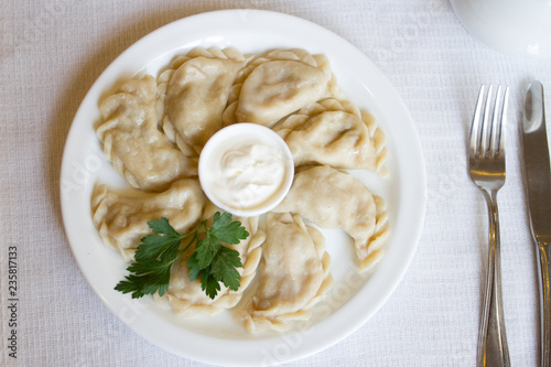 dumplings with sour cream and parsley