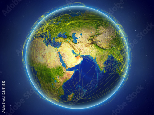 Fototapeta Naklejka Na Ścianę i Meble -  United Arab Emirates from space on planet Earth with digital network representing international communication, technology and travel.