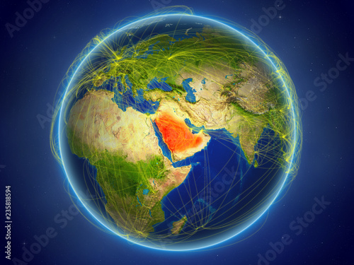 Fototapeta Naklejka Na Ścianę i Meble -  Saudi Arabia from space on planet Earth with digital network representing international communication, technology and travel.