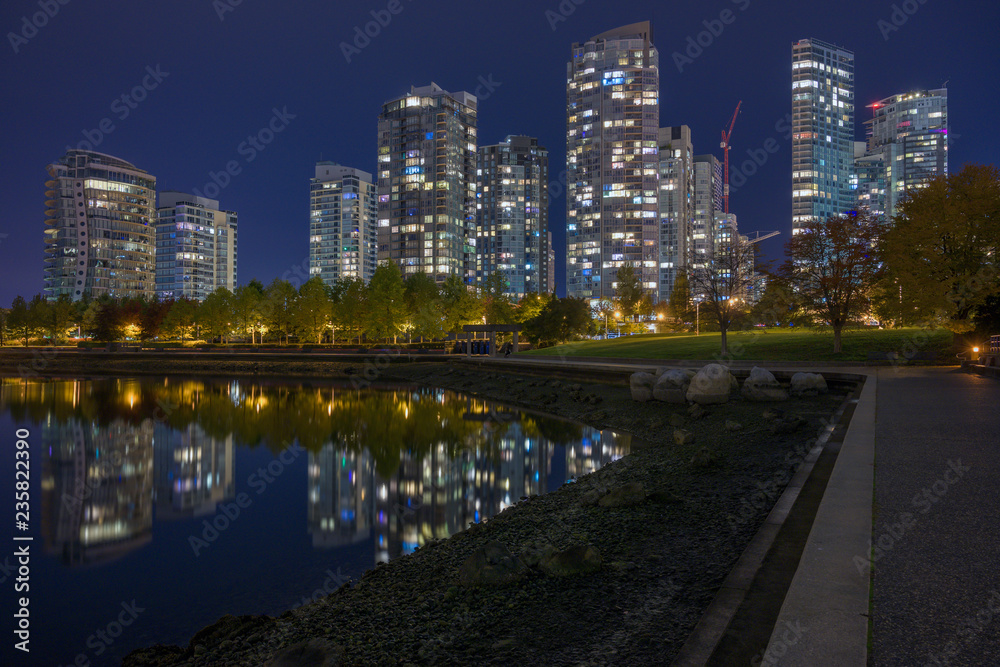 Downtown Vancouver at night from Yaletown waterfront.