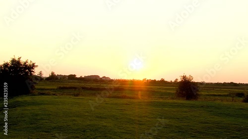 sunset in Friesland in meadow photo