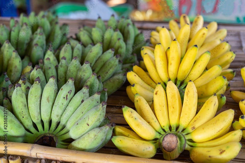 Yellow and green bananas In the market