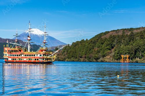 Mountain Fuji and Lake Ashi with Hakone temple and sightseeing boat in autumn photo