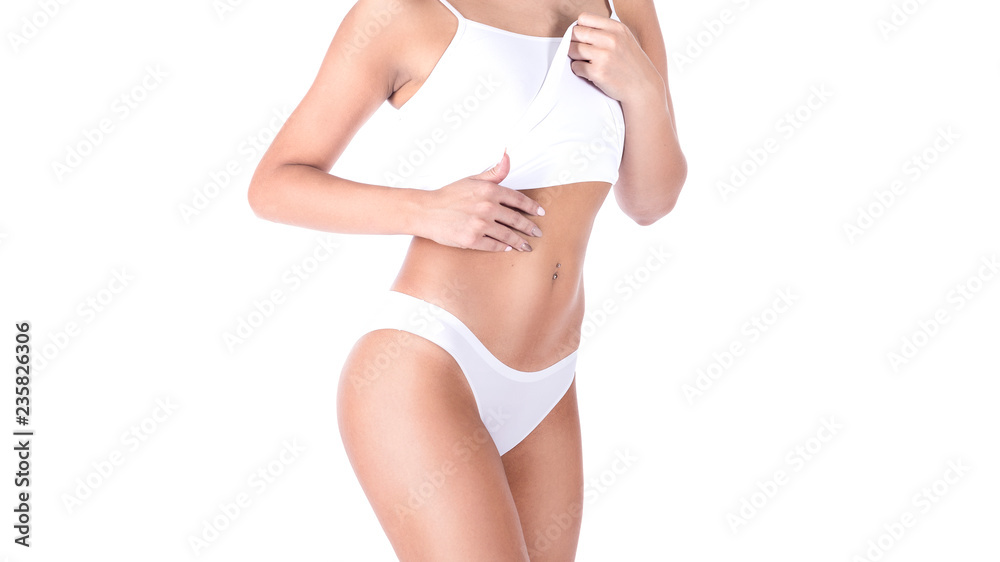 Beautiful female body in white underwear, isolated on white.