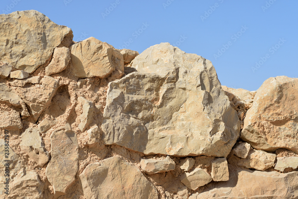 Ancient stone wall background and texture