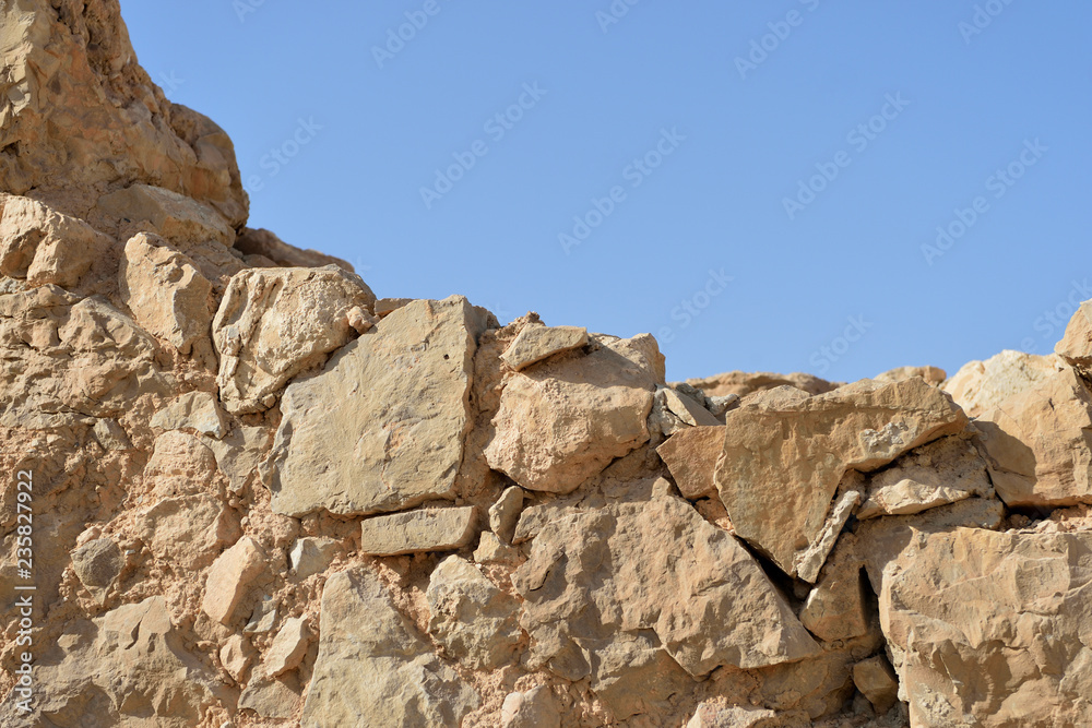 Ancient stone wall background and texture