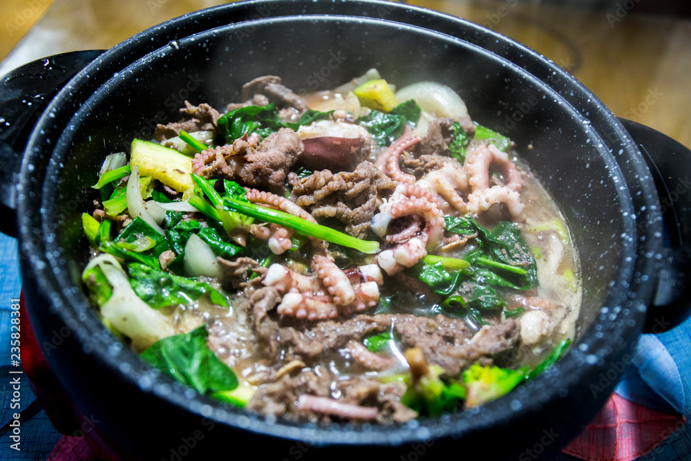 bulgogi, marinated  beef and Nakji, small octopus is cooked
