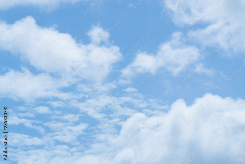 Naklejka premium Clouds are divided into layers in the evening with light.