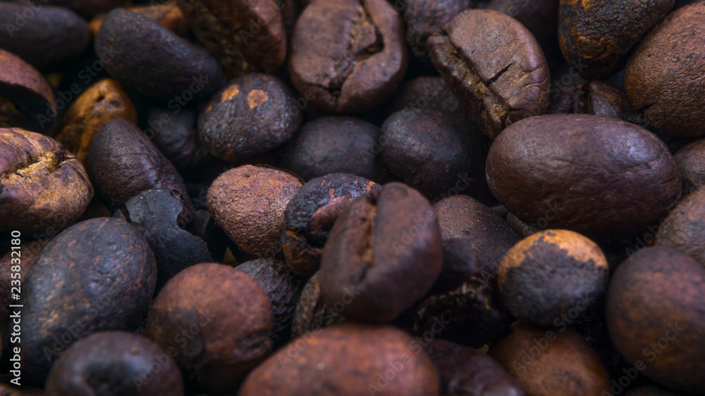 Coffee beans closeup with selective focus and crop fragment Coffee beans closeup with selective focus and crop fragment