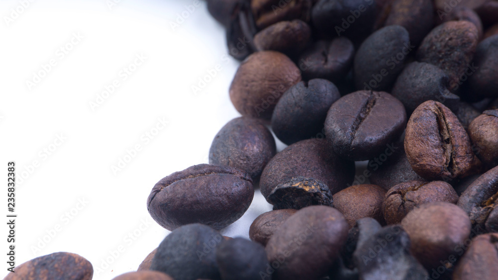 Coffee beans closeup with selective focus and crop fragment Coffee beans closeup with selective focus and crop fragment