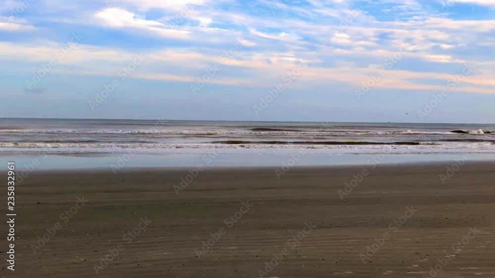 Galveston beach as waves crash in pan to the boardwalk 4K 30FPS, Galveston beach as waves crash in pan to the boardwalk 4K 30FPS,