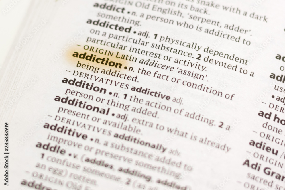 The word or phrase Addiction in a dictionary. The word or phrase Addiction in a dictionary.