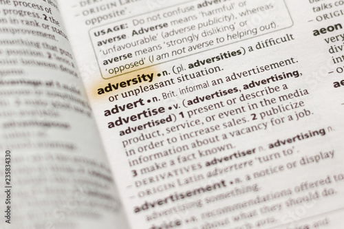 Obraz na płótnie The word or phrase Adversity in a dictionary.