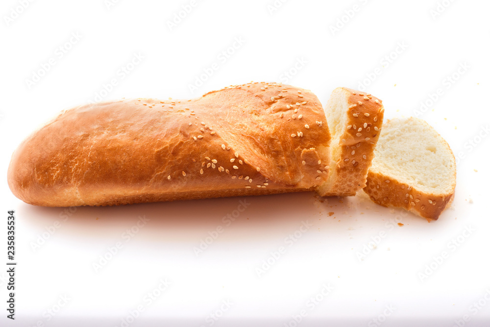 Sliced fresh baguette isolated on white background Sliced fresh baguette isolated on white background