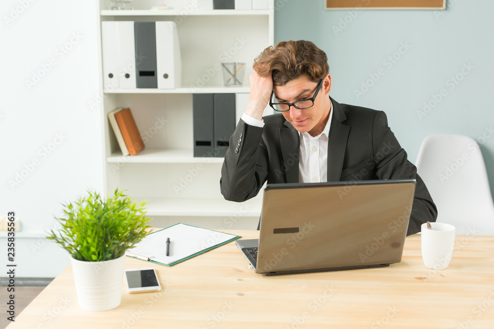 Humor, joke and business people concept - funny man tired after working on computer in office Humor, joke and business people concept - funny man tired after working on computer in office