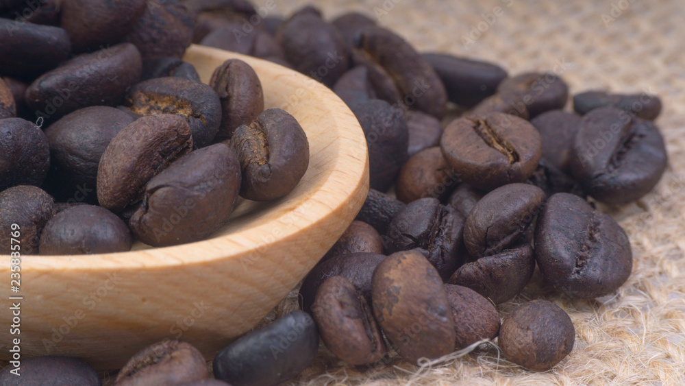 Coffee beans closeup with selective focus and crop fragment Coffee beans closeup with selective focus and crop fragment