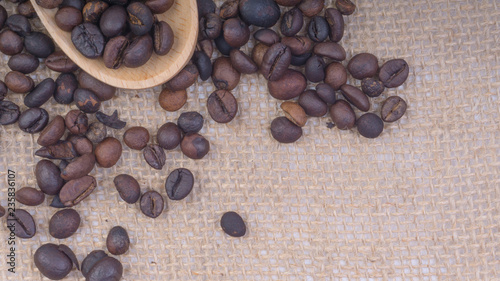 Fototapeta Naklejka Na Ścianę i Meble -  Coffee beans closeup with selective focus and crop fragment