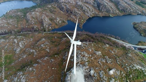 Aerial footage of a slow rotating Windmill high POI shot photo