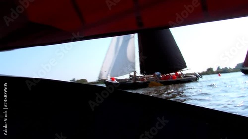 sailing with classic boats on inhore water Friesland The Netherlands photo