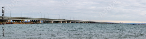 Low water bridge from Sedanka to the De Friz peninsula across the Amur Bay of Primorsky Krai Russia.