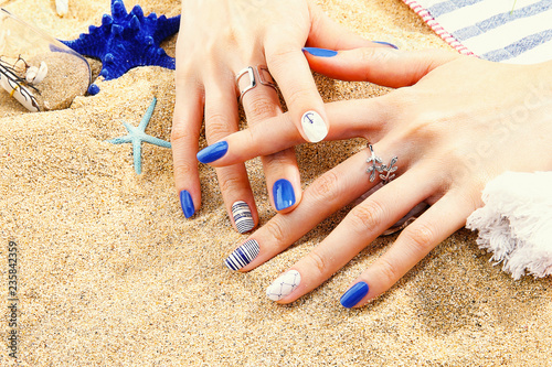 a woman's nail, designed with nail art