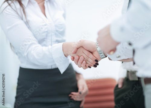 close up.the image of the handshake colleagues
