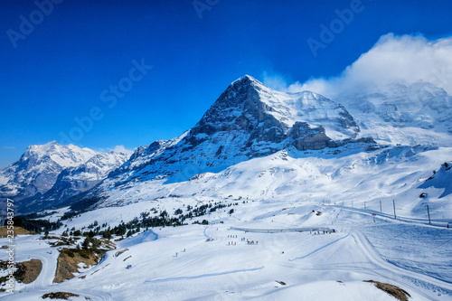 Winter landscape view from Kleine Scheidegg along the railway from to Jungfraujoch In daylight at Switzerland photo