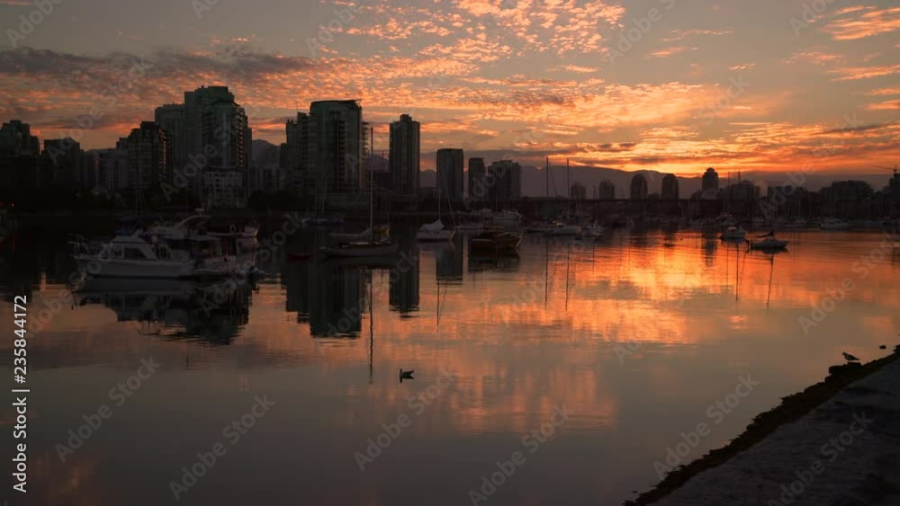 False Creek Sunrise Anchorage, 4K UHD. Dolly shot along the seawall in False Creek. Vancouver, British Columbia, Canada. 4K UHD. False Creek Sunrise Anchorage, 4K UHD. Dolly shot along the seawall in False Creek. Vancouver, British Columbia, Canada. 4K UHD.
