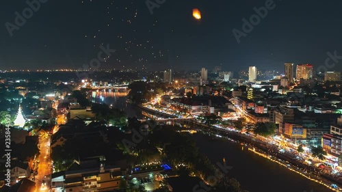4K Timelapse of Floating lanterns and People in Yee Peng Festival or Loy Krathong celebration in Chiangmai, Thailand. (Zoom-Out)