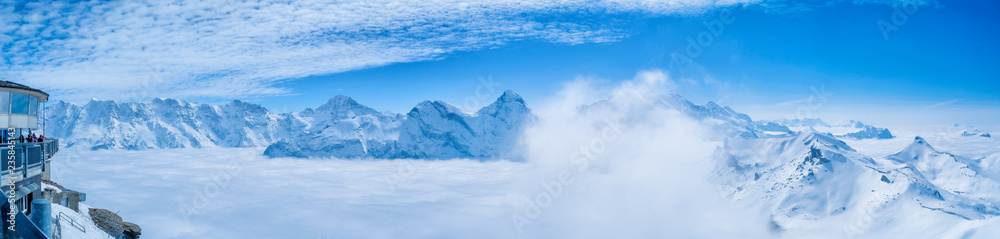 Stunning Panoramic view snow mountain of the Swiss Skyline from Schilthorn Piz Gloria, Switzerland Stunning Panoramic view snow mountain of the Swiss Skyline from Schilthorn Piz Gloria, Switzerland