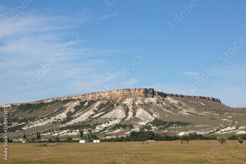 View of White rock or Aq Qaya on a Sunny summer day. Crimea. photo