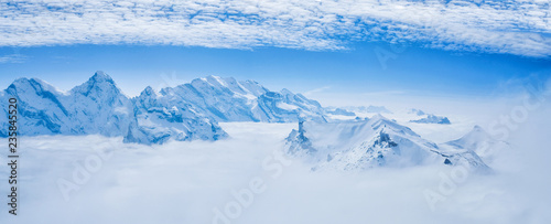Stunning Panoramic view snow mounain of the Swiss Skyline from Schilthorn, Switzerland
