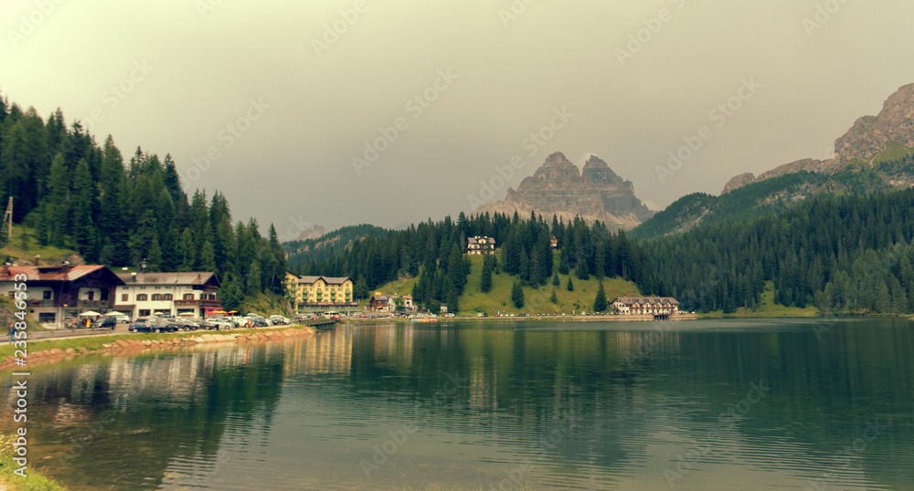 Auronzo di Cadore, Italy August 9, 2018: Misurina Mountain Lake. Beautiful tourist place with houses and cafes.