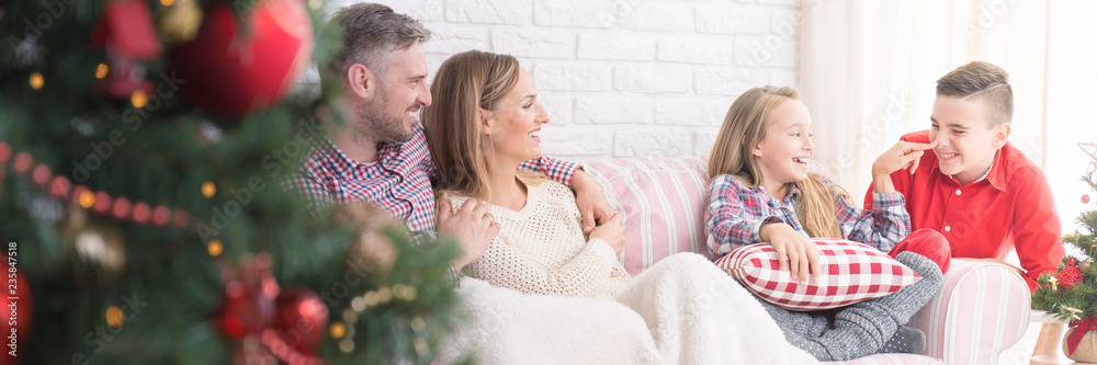 © Photographee.eu - Couch with family sitting together © Photographee.eu - Couch with family sitting together