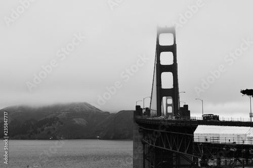 The golden gate bridge in the fog. San Francisco, CA.