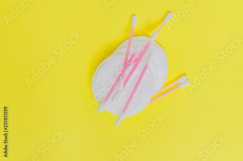 Cosmetic cotton pads and cotton sticks on white background. Make yp and skincare concept.