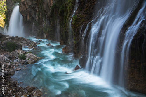 Fototapeta Naklejka Na Ścianę i Meble -  Massive waterfall with blue river
