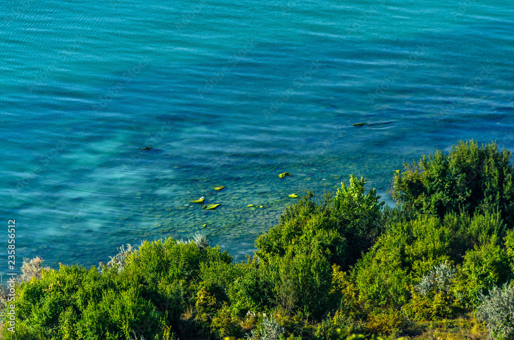 Green Thracian cliffs near blue clear water of Black Sea, rocky path seaview