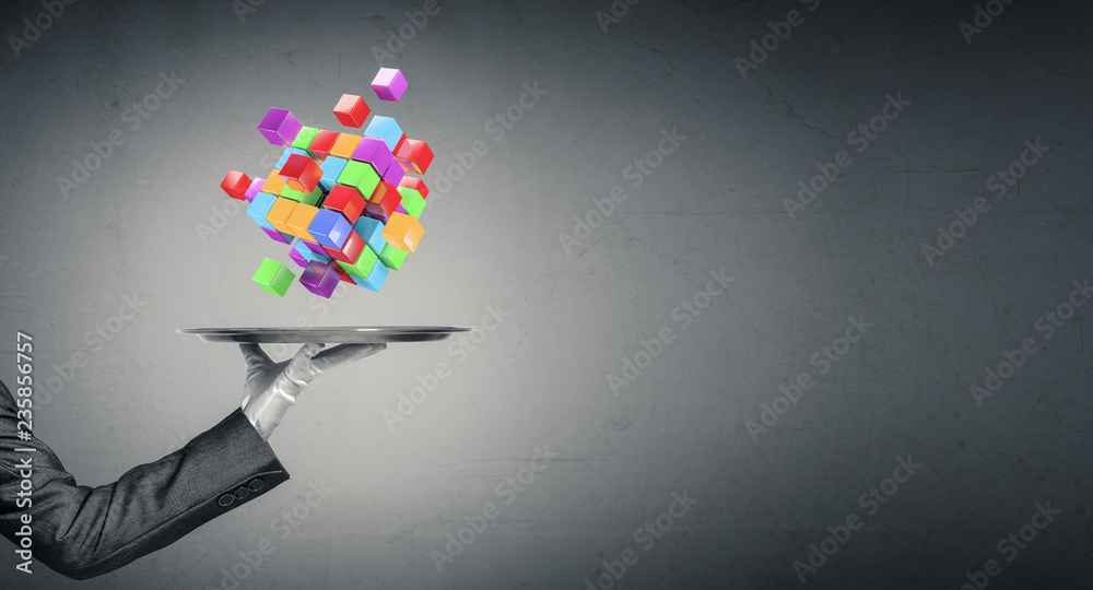 Hand of waiter presenting cubes on tray. Hand of waiter presenting cubes on tray.