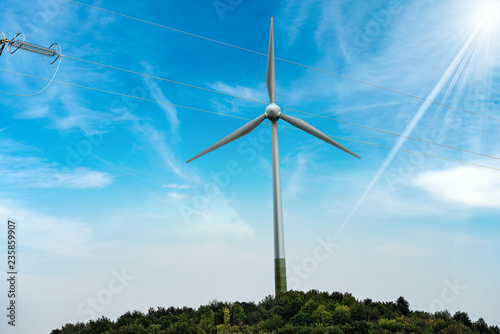 Wind Turbine with a Power Line on Blue Sky