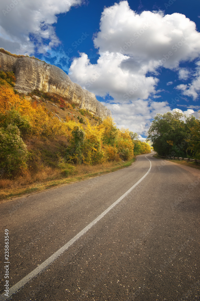 Fototapeta premium Asphalt Road path walkway near autumn mountain.