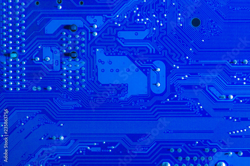 Macro close-up of blue circuit board