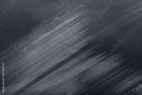 full frame image of black table with flour strokes