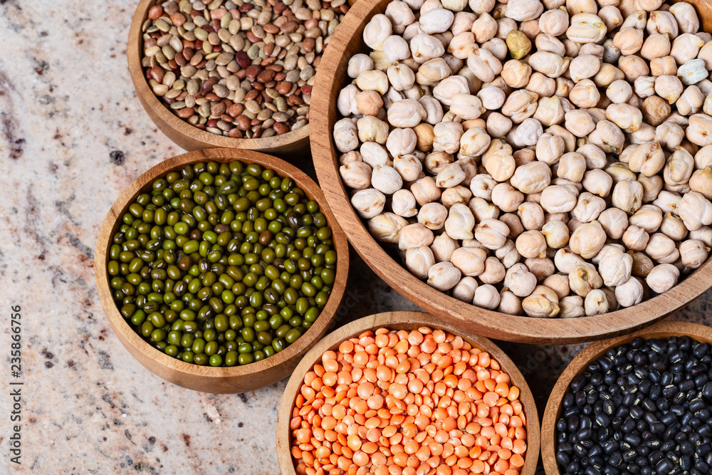 Various assortment of legumes - beans, chickpeas, lentils, black and green orid dal. Vegetable proteins. Various assortment of legumes - beans, chickpeas, lentils, black and green orid dal. Vegetable proteins.
