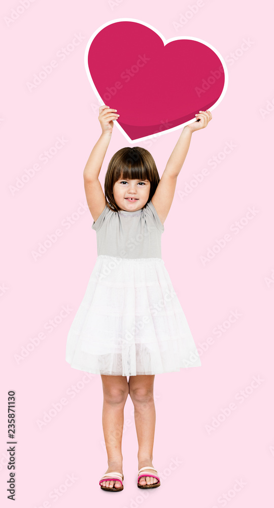 Happy girl holding a heart icon
