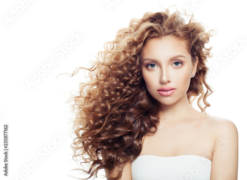 Isolated spa woman with healthy skin and perfect wavy hairstyle