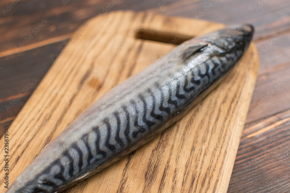 Mackerel fish on wooden background. Mackerel fish on wooden background.