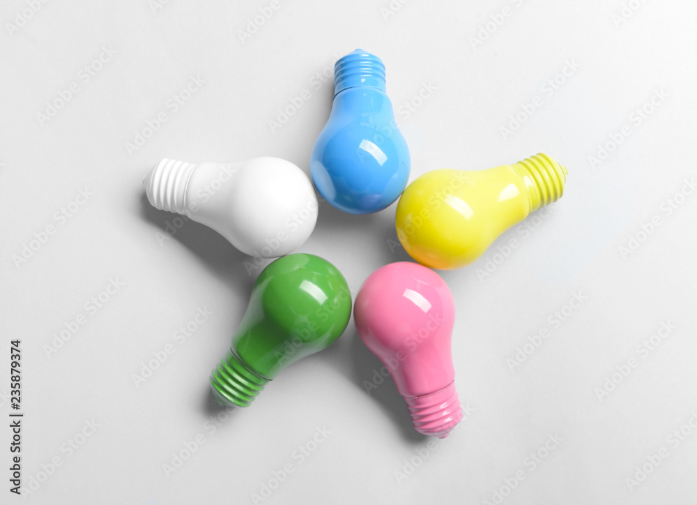 Painted light bulbs on white background Painted light bulbs on white background