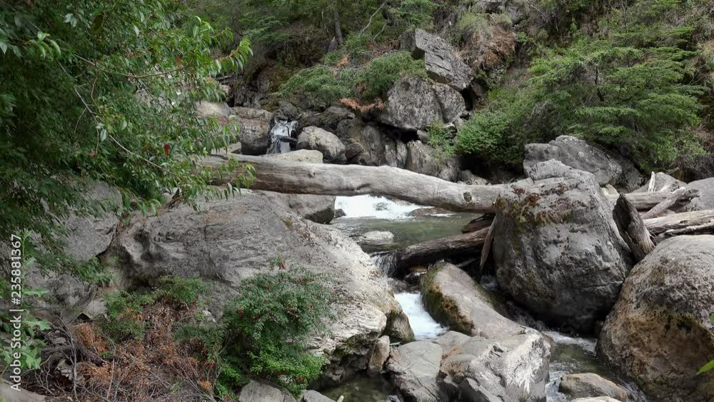 Arroyo Grande waterfall near Quila Quina village at Lacar lake. San Martin de los Andes, Patagonia, Neuquen, Argentina Arroyo Grande waterfall near Quila Quina village at Lacar lake. San Martin de los Andes, Patagonia, Neuquen, Argentina
